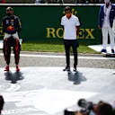 SPA, BELGIUM - AUGUST 30: Max Verstappen of Netherlands and Red Bull Racing, Carlos Sainz of Spain and McLaren F1 and Daniil Kvyat of Russia and Scuderia AlphaTauri take part in a minute of silence in tribute to the late Anthoine Hubert before the F1 Grand Prix of Belgium at Circuit de Spa-Francorchamps on August 30, 2020 in Spa, Belgium. (Photo by Peter Fox/Getty Images)