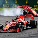 SPA, BELGIUM - AUGUST 30: Sebastian Vettel of Germany driving the (5) Scuderia Ferrari SF1000 leads Charles Leclerc of Monaco driving the (16) Scuderia Ferrari SF1000 locking a wheel under braking during the F1 Grand Prix of Belgium at Circuit de Spa-Francorchamps on August 30, 2020 in Spa, Belgium. (Photo by Clive Mason - Formula 1/Formula 1 via Getty Images)