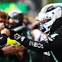 SPA, BELGIUM - AUGUST 30: Second placed Valtteri Bottas of Finland and Mercedes GP celebrates with teammates in parc ferme during the F1 Grand Prix of Belgium at Circuit de Spa-Francorchamps on August 30, 2020 in Spa, Belgium. (Photo by Dan Istitene - Formula 1/Formula 1 via Getty Images)