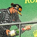 SPA, BELGIUM - AUGUST 30: Race winner Lewis Hamilton of Great Britain and Mercedes GP celebrates on the podium during the F1 Grand Prix of Belgium at Circuit de Spa-Francorchamps on August 30, 2020 in Spa, Belgium. (Photo by Clive Mason - Formula 1/Formula 1 via Getty Images)