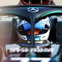 IMOLA, ITALY - OCTOBER 31: Pole position qualifier Valtteri Bottas of Finland and Mercedes GP looks on from his car as he arrives in parc ferme during qualifying ahead of the F1 Grand Prix of Emilia Romagna at Autodromo Enzo e Dino Ferrari on October 31, 2020 in Imola, Italy. (Photo by Dan Istitene - Formula 1/Formula 1 via Getty Images)