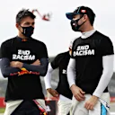 IMOLA, ITALY - NOVEMBER 01: Alexander Albon of Thailand and Red Bull Racing and Nicholas Latifi of Canada and Williams talk on the grid before the F1 Grand Prix of Emilia Romagna at Autodromo Enzo e Dino Ferrari on November 01, 2020 in Imola, Italy. (Photo by Lars Baron - Formula 1/Formula 1 via Getty Images)