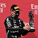 IMOLA, ITALY - NOVEMBER 01: Second place Valtteri Bottas of Finland and Mercedes GP celebrates on the podium during the F1 Grand Prix of Emilia Romagna at Autodromo Enzo e Dino Ferrari on November 01, 2020 in Imola, Italy. (Photo by Miguel Medina - Pool/Getty Images)