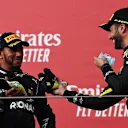 IMOLA, ITALY - NOVEMBER 01: Race winner Lewis Hamilton of Great Britain and Mercedes GP and third placed Daniel Ricciardo of Australia and Renault Sport F1 celebrate on the podium during the F1 Grand Prix of Emilia Romagna at Autodromo Enzo e Dino Ferrari on November 01, 2020 in Imola, Italy. (Photo by Lars Baron - Formula 1/Formula 1 via Getty Images)