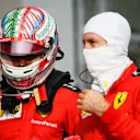 IMOLA, ITALY - NOVEMBER 01: Charles Leclerc of Monaco and Ferrari speaks with teammate Sebastian Vettel of Germany and Ferrari in parc ferme during the F1 Grand Prix of Emilia Romagna at Autodromo Enzo e Dino Ferrari on November 01, 2020 in Imola, Italy. (Photo by Rudy Carezzevoli/Getty Images)
