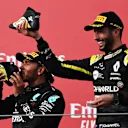 IMOLA, ITALY - NOVEMBER 01: Race winner Lewis Hamilton of Great Britain and Mercedes GP and third placed Daniel Ricciardo of Australia and Renault Sport F1 celebrate on the podium during the F1 Grand Prix of Emilia Romagna at Autodromo Enzo e Dino Ferrari on November 01, 2020 in Imola, Italy. (Photo by Lars Baron - Formula 1/Formula 1 via Getty Images)