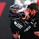 IMOLA, ITALY - NOVEMBER 01: Race winner Lewis Hamilton of Great Britain and Mercedes GP celebrates the 7th consecutive F1 Constructors Championship with Mercedes GP Executive Director Toto Wolff in parc ferme during the F1 Grand Prix of Emilia Romagna at Autodromo Enzo e Dino Ferrari on November 01, 2020 in Imola, Italy. (Photo by Dan Istitene - Formula 1/Formula 1 via Getty Images)