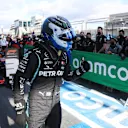 NUERBURG, GERMANY - OCTOBER 10: Pole position qualifier Valtteri Bottas of Finland and Mercedes GP celebrates in parc ferme during qualifying ahead of the F1 Eifel Grand Prix at Nuerburgring on October 10, 2020 in Nuerburg, Germany. (Photo by Wolfgang Rattay - Pool/Getty Images)