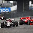 NUERBURG, GERMANY - OCTOBER 11: Antonio Giovinazzi of Italy driving the (99) Alfa Romeo Racing C39 Ferrari as Sebastian Vettel of Germany driving the (5) Scuderia Ferrari SF1000 behind loses control into the corner during the F1 Eifel Grand Prix at Nuerburgring on October 11, 2020 in Nuerburg, Germany. (Photo by Dan Istitene - Formula 1/Formula 1 via Getty Images)