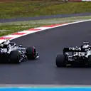NUERBURG, GERMANY - OCTOBER 11: Lewis Hamilton of Great Britain driving the (44) Mercedes AMG Petronas F1 Team Mercedes W11 overtakes Valtteri Bottas of Finland driving the (77) Mercedes AMG Petronas F1 Team Mercedes W11 during the F1 Eifel Grand Prix at Nuerburgring on October 11, 2020 in Nuerburg, Germany. (Photo by Dan Istitene - Formula 1/Formula 1 via Getty Images)