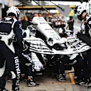 NUERBURG, GERMANY - OCTOBER 11: Daniil Kvyat of Russia driving the (26) Scuderia AlphaTauri AT01 Honda makes a pitstop for a new front wing during the F1 Eifel Grand Prix at Nuerburgring on October 11, 2020 in Nuerburg, Germany. (Photo by Peter Fox/Getty Images)