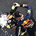 NUERBURG, GERMANY - OCTOBER 11: Daniel Ricciardo of Renault and Second placed Max Verstappen of Netherlands and Red Bull Racing celebrate on the podium during the F1 Eifel Grand Prix at Nuerburgring on October 11, 2020 in Nuerburg, Germany. (Photo by Getty Images/Getty Images)
