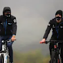 NUERBURG, GERMANY - OCTOBER 08: George Russell of Great Britain and Williams (left) cycles the track during previews ahead of the F1 Eifel Grand Prix at Nuerburgring on October 08, 2020 in Nuerburg, Germany. (Photo by Bryn Lennon/Getty Images)