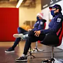 NUERBURG, GERMANY - OCTOBER 08: Lance Stroll of Canada and Racing Point and Sergio Perez of Mexico and Racing Point talk in the Drivers Press Conference during previews ahead of the F1 Eifel Grand Prix at Nuerburgring on October 08, 2020 in Nuerburg, Germany. (Photo by XPB - Pool/Getty Images)