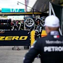 NORTHAMPTON, ENGLAND - AUGUST 01: Pole position qualifier Lewis Hamilton of Great Britain and Mercedes GP talks to the media in parc ferme during qualifying for the F1 Grand Prix of Great Britain at Silverstone on August 01, 2020 in Northampton, England. (Photo by Will Oliver/Pool via Getty Images)
