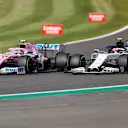 NORTHAMPTON, ENGLAND - AUGUST 02: Lance Stroll of Canada driving the (18) Racing Point RP20 Mercedes battles for position with Pierre Gasly of France driving the (10) Scuderia AlphaTauri AT01 Honda during the F1 Grand Prix of Great Britain at Silverstone on August 02, 2020 in Northampton, England. (Photo by Andrew Boyers/Pool via Getty Images)