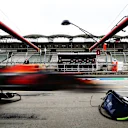 BUDAPEST, HUNGARY - JULY 18: Alexander Albon of Thailand driving the (23) Aston Martin Red Bull Racing RB16 passes his garage during qualifying for the F1 Grand Prix of Hungary at Hungaroring on July 18, 2020 in Budapest, Hungary. (Photo by Getty Images/Getty Images)