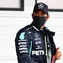 BUDAPEST, HUNGARY - JULY 18: Pole position qualifier Lewis Hamilton of Great Britain and Mercedes GP looks on in parc ferme  during qualifying for the F1 Grand Prix of Hungary at Hungaroring on July 18, 2020 in Budapest, Hungary. (Photo by Dan Istitene - Formula 1/Formula 1 via Getty Images)