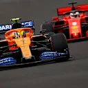 BUDAPEST, HUNGARY - JULY 18: Lando Norris of Great Britain driving the (4) McLaren F1 Team MCL35 Renault leads Sebastian Vettel of Germany driving the (5) Scuderia Ferrari SF1000 during qualifying for the F1 Grand Prix of Hungary at Hungaroring on July 18, 2020 in Budapest, Hungary. (Photo by Leonhard Foeger/Pool via Getty Images)