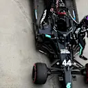 BUDAPEST, HUNGARY - JULY 18: Pole position qualifier Lewis Hamilton of Great Britain and Mercedes GP celebrates in parc ferme  during qualifying for the F1 Grand Prix of Hungary at Hungaroring on July 18, 2020 in Budapest, Hungary. (Photo by Mario Renzi - Formula 1/Formula 1 via Getty Images)