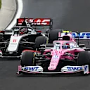 BUDAPEST, HUNGARY - JULY 19: Lance Stroll of Canada driving the (18) Racing Point RP20 Mercedes leads Romain Grosjean of France driving the (8) Haas F1 Team VF-20 Ferrari during the Formula One Grand Prix of Hungary at Hungaroring on July 19, 2020 in Budapest, Hungary. (Photo by Dan Istitene - Formula 1/Formula 1 via Getty Images)
