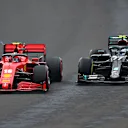 BUDAPEST, HUNGARY - JULY 19: Charles Leclerc of Monaco driving the (16) Scuderia Ferrari SF1000 and Valtteri Bottas of Finland driving the (77) Mercedes AMG Petronas F1 Team Mercedes W11 battle for position during the Formula One Grand Prix of Hungary at Hungaroring on July 19, 2020 in Budapest, Hungary. (Photo by Dan Istitene - Formula 1/Formula 1 via Getty Images)