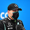 BUDAPEST, HUNGARY - JULY 19: Third placed Valtteri Bottas of Finland and Mercedes GP is interviewed in parc ferme after the Formula One Grand Prix of Hungary at Hungaroring on July 19, 2020 in Budapest, Hungary. (Photo by Joe Klamar/Pool via Getty Images)