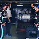 MONZA, ITALY - SEPTEMBER 05: Pole position qualifier Lewis Hamilton of Great Britain and Mercedes GP talks to second placed qualifier Valtteri Bottas of Finland and Mercedes GP in the garage during qualifying for the F1 Grand Prix of Italy at Autodromo di Monza on September 05, 2020 in Monza, Italy. (Photo by Jenifer Lorenzini - Pool/Getty Images)