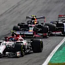 MONZA, ITALY - SEPTEMBER 06: Alexander Albon of Thailand driving the (23) Aston Martin Red Bull Racing RB16 battles for position with Romain Grosjean of France driving the (8) Haas F1 Team VF-20 Ferrari during the F1 Grand Prix of Italy at Autodromo di Monza on September 06, 2020 in Monza, Italy. (Photo by Mark Thompson/Getty Images)