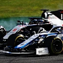 MONZA, ITALY - SEPTEMBER 06: George Russell of Great Britain driving the (63) Williams Racing FW43 Mercedes and Romain Grosjean of France driving the (8) Haas F1 Team VF-20 Ferrari battle for position during the F1 Grand Prix of Italy at Autodromo di Monza on September 06, 2020 in Monza, Italy. (Photo by Dan Istitene - Formula 1/Formula 1 via Getty Images)
