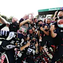 MONZA, ITALY - SEPTEMBER 06: The Scuderia AlphaTauri team celebrate the win of Pierre Gasly of France and Scuderia AlphaTauri during the F1 Grand Prix of Italy at Autodromo di Monza on September 06, 2020 in Monza, Italy. (Photo by Peter Fox/Getty Images)