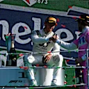 MONZA, ITALY - SEPTEMBER 06: Race winner Pierre Gasly of France and Scuderia AlphaTauri is congratulated by third placed Lance Stroll of Canada and Racing Point during the F1 Grand Prix of Italy at Autodromo di Monza on September 06, 2020 in Monza, Italy. (Photo by Rudy Carezzevoli/Getty Images)