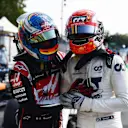 MONZA, ITALY - SEPTEMBER 06: Race winner Pierre Gasly of France and Scuderia AlphaTauri celebrates with Romain Grosjean of France and Haas F1 in parc ferme during the F1 Grand Prix of Italy at Autodromo di Monza on September 06, 2020 in Monza, Italy. (Photo by Miguel Medina - Pool/Getty Images)