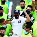 MONZA, ITALY - SEPTEMBER 06: Race winner Pierre Gasly of France and Scuderia AlphaTauri celebrates with team members during the F1 Grand Prix of Italy at Autodromo di Monza on September 06, 2020 in Monza, Italy. (Photo by Dan Istitene - Formula 1/Formula 1 via Getty Images)