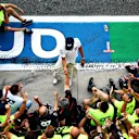 MONZA, ITALY - SEPTEMBER 06: Race winner Pierre Gasly of France and Scuderia AlphaTauri and teammate Daniil Kvyat of Russia and Scuderia AlphaTauri celebrate with team members during the F1 Grand Prix of Italy at Autodromo di Monza on September 06, 2020 in Monza, Italy. (Photo by Dan Istitene - Formula 1/Formula 1 via Getty Images)