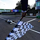 MONZA, ITALY - SEPTEMBER 06: Race winner Pierre Gasly of France driving the (10) Scuderia AlphaTauri AT01 Honda takes the chequered flag as he crosses the line during the F1 Grand Prix of Italy at Autodromo di Monza on September 06, 2020 in Monza, Italy. (Photo by Mario Renzi - Formula 1/Formula 1 via Getty Images)