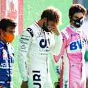 MONZA, ITALY - SEPTEMBER 06: Race winner Pierre Gasly of France and Scuderia AlphaTauri, second placed Carlos Sainz of Spain and McLaren F1 and third placed Lance Stroll of Canada and Racing Point stand on the podium during the F1 Grand Prix of Italy at Autodromo di Monza on September 06, 2020 in Monza, Italy. (Photo by Mark Thompson/Getty Images)
