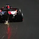 PORTIMAO, PORTUGAL - OCTOBER 23: Sparks fly behind Kimi Raikkonen of Finland driving the (7) Alfa Romeo Racing C39 Ferrari during practice ahead of the F1 Grand Prix of Portugal at Autodromo Internacional do Algarve on October 23, 2020 in Portimao, Portugal. (Photo by Bryn Lennon - Formula 1/Formula 1 via Getty Images)