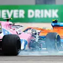 PORTIMAO, PORTUGAL - OCTOBER 25: Lance Stroll of Canada driving the (18) Racing Point RP20 Mercedes and Lando Norris of Great Britain driving the (4) McLaren F1 Team MCL35 Renault crash during the F1 Grand Prix of Portugal at Autodromo Internacional do Algarve on October 25, 2020 in Portimao, Portugal. (Photo by Dan Istitene - Formula 1/Formula 1 via Getty Images)