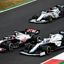 PORTIMAO, PORTUGAL - OCTOBER 25: Kevin Magnussen of Denmark driving the (20) Haas F1 Team VF-20 Ferrari battles for position with Nicholas Latifi of Canada driving the (6) Williams Racing FW43 Mercedes during the F1 Grand Prix of Portugal at Autodromo Internacional do Algarve on October 25, 2020 in Portimao, Portugal. (Photo by Bryn Lennon - Formula 1/Formula 1 via Getty Images)