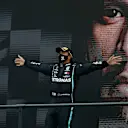 PORTIMAO, PORTUGAL - OCTOBER 25: Race winner Lewis Hamilton of Great Britain and Mercedes GP celebrates his record breaking 92nd race win on the podium during the F1 Grand Prix of Portugal at Autodromo Internacional do Algarve on October 25, 2020 in Portimao, Portugal. (Photo by Rafael Marchante - Pool/Getty Images)