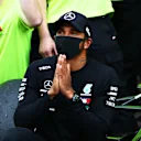 PORTIMAO, PORTUGAL - OCTOBER 25: Race winner Lewis Hamilton of Great Britain and Mercedes GP celebrates his record breaking 92nd race win after the F1 Grand Prix of Portugal at Autodromo Internacional do Algarve on October 25, 2020 in Portimao, Portugal. (Photo by Dan Istitene - Formula 1/Formula 1 via Getty Images)