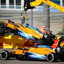 SOCHI, RUSSIA - SEPTEMBER 27: The car of Carlos Sainz of Spain and McLaren F1 is removed from the track after crashing on the first lap during the F1 Grand Prix of Russia at Sochi Autodrom on September 27, 2020 in Sochi, Russia. (Photo by Bryn Lennon/Getty Images)