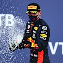 SOCHI, RUSSIA - SEPTEMBER 27: Second placed Max Verstappen of Netherlands and Red Bull Racing celebrates on the podium during the F1 Grand Prix of Russia at Sochi Autodrom on September 27, 2020 in Sochi, Russia. (Photo by Bryn Lennon/Getty Images)