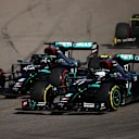 SOCHI, RUSSIA - SEPTEMBER 27: Valtteri Bottas of Finland driving the (77) Mercedes AMG Petronas F1 Team Mercedes W11 and Lewis Hamilton of Great Britain driving the (44) Mercedes AMG Petronas F1 Team Mercedes W11 battle for position during the F1 Grand Prix of Russia at Sochi Autodrom on September 27, 2020 in Sochi, Russia. (Photo by Bryn Lennon/Getty Images)