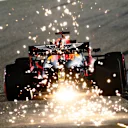 BAHRAIN, BAHRAIN - DECEMBER 04: Sparks fly behind Max Verstappen of the Netherlands driving the (33) Aston Martin Red Bull Racing RB16 during practice ahead of the F1 Grand Prix of Sakhir at Bahrain International Circuit on December 04, 2020 in Bahrain, Bahrain. (Photo by Clive Mason - Formula 1/Formula 1 via Getty Images)