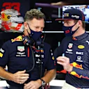 BAHRAIN, BAHRAIN - DECEMBER 05: Red Bull Racing Team Principal Christian Horner speaks with Max Verstappen of Netherlands and Red Bull Racing in the garage before qualifying ahead of the F1 Grand Prix of Sakhir at Bahrain International Circuit on December 05, 2020 in Bahrain, Bahrain. (Photo by Mark Thompson/Getty Images)