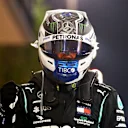 BAHRAIN, BAHRAIN - DECEMBER 05: Pole position qualifier Valtteri Bottas of Finland and Mercedes GP celebrates in parc ferme during qualifying ahead of the F1 Grand Prix of Sakhir at Bahrain International Circuit on December 05, 2020 in Bahrain, Bahrain. (Photo by Dan Istitene - Formula 1/Formula 1 via Getty Images)