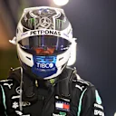 BAHRAIN, BAHRAIN - DECEMBER 05: Pole position qualifier Valtteri Bottas of Finland and Mercedes GP celebrates in parc ferme during qualifying ahead of the F1 Grand Prix of Sakhir at Bahrain International Circuit on December 05, 2020 in Bahrain, Bahrain. (Photo by Dan Istitene - Formula 1/Formula 1 via Getty Images)