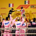 BAHRAIN, BAHRAIN - DECEMBER 06: Race winner Sergio Perez of Mexico and Racing Point and second placed Esteban Ocon of France and Renault Sport F1 celebrate on the podium during the F1 Grand Prix of Sakhir at Bahrain International Circuit on December 06, 2020 in Bahrain, Bahrain. (Photo by Hamad I Mohammed - Pool/Getty Images)